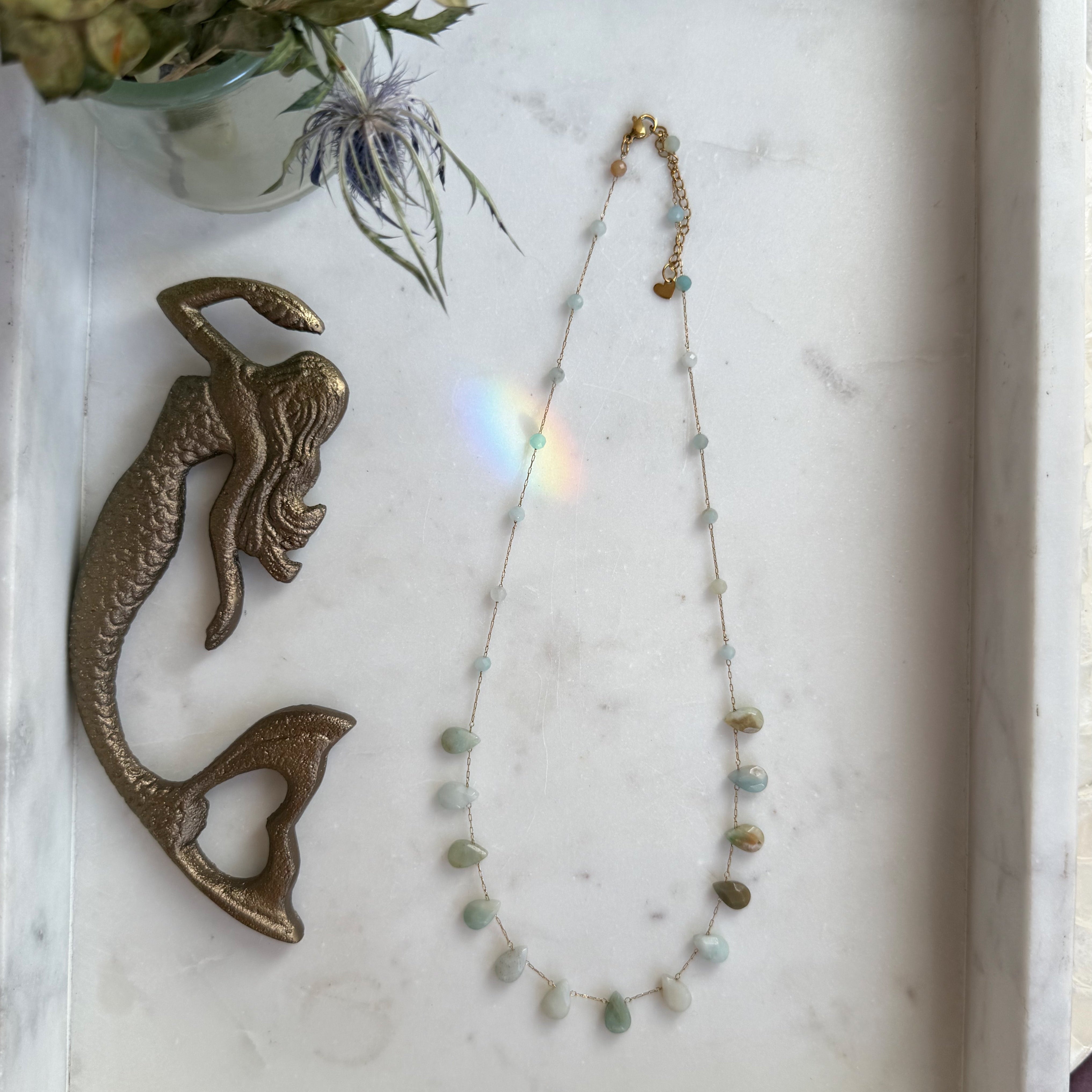 The Celeste Necklace by Wild Alabaster — 14 k gold-filled chain with amazonite drops, grounding crystal jewelry inspired by flow and ease.