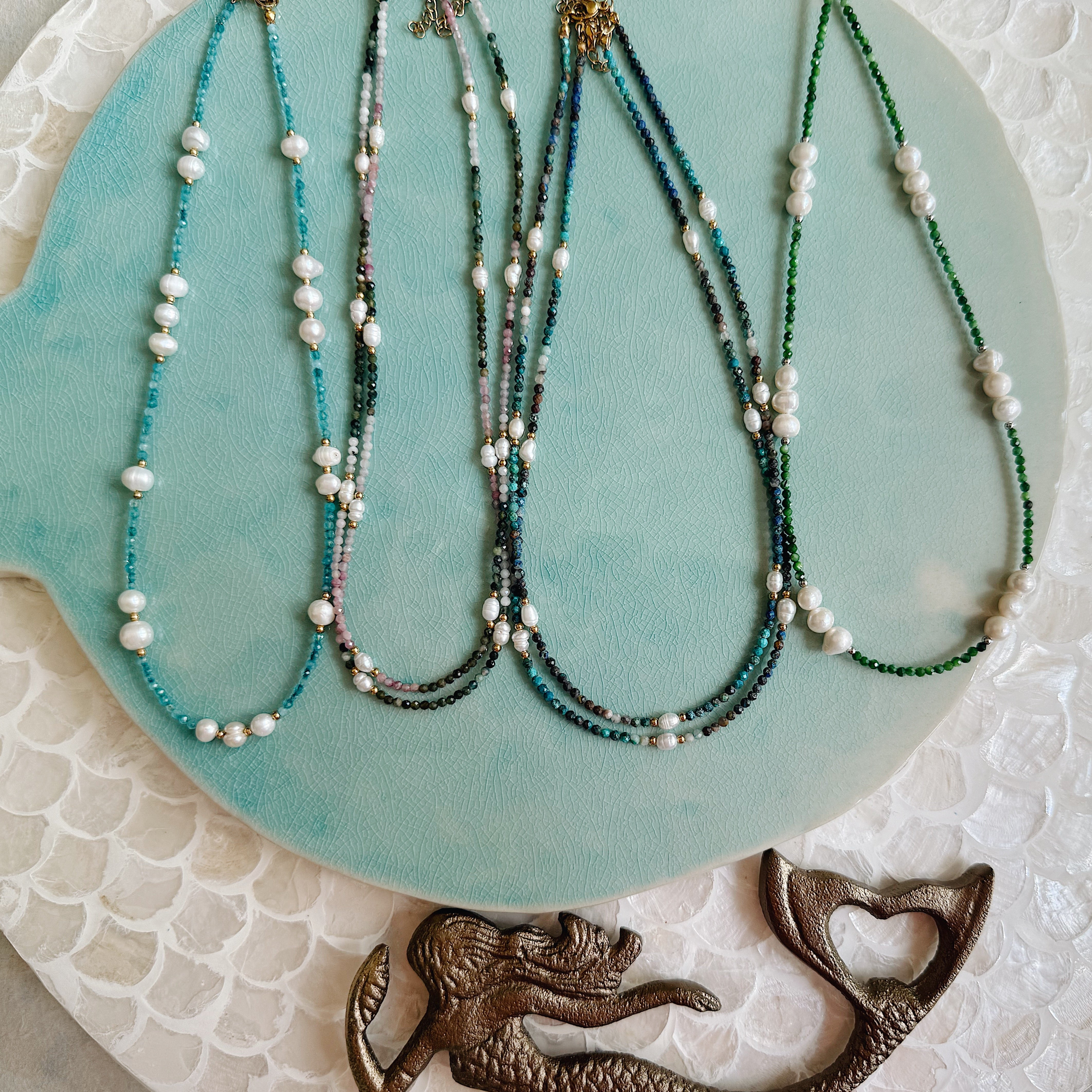 The Willa Necklace – freshwater pearl and gemstone layering necklaces in turquoise, amazonite, tourmaline, and diopside with gold or silver finish
