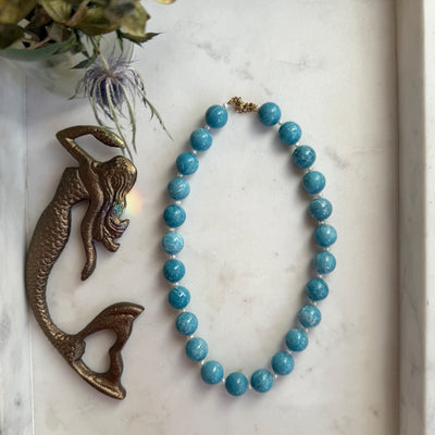 Doris necklace by Wild Alabaster — handcrafted jewelry featuring Blue Aragonite and pearl for calm, devotion, and ocean-inspired energy.