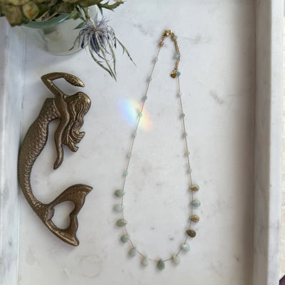 The Celeste Necklace by Wild Alabaster — 14 k gold-filled chain with amazonite drops, grounding crystal jewelry inspired by flow and ease.