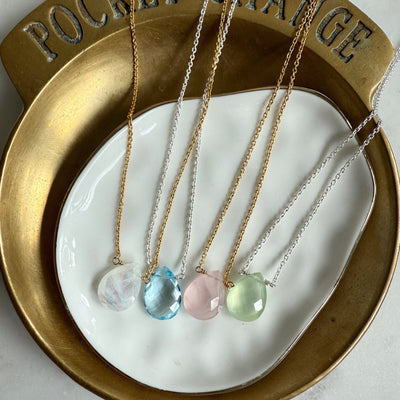 The Luna Drop Necklace by Wild Alabaster — delicate gemstone pendant on 18k gold vermeil or sterling silver chain, minimalist layering design.