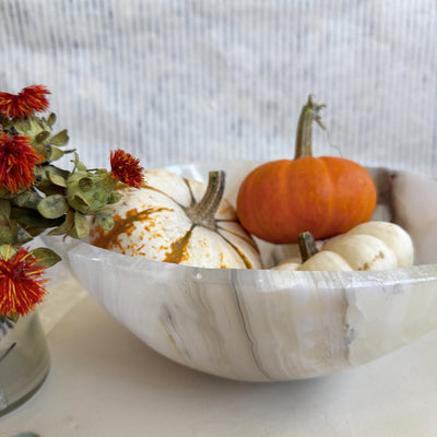 Hand-carved black onyx bowl from Wild Alabaster – grounding crystal decor used for jewelry, rituals, and home energy clearing.